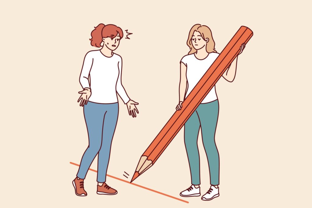 Жінка великим червоним олівцем проводить лінію між собою та кимось іншим, встановлюючи межу.